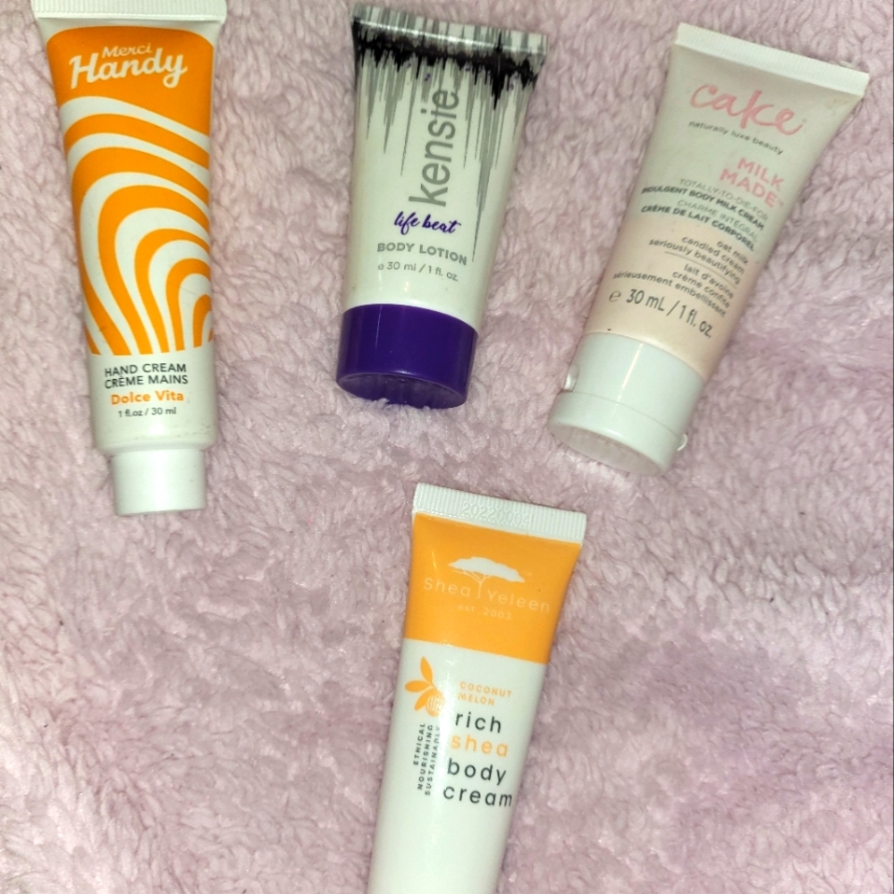 Set of 4 Lotions travel size cake merci,kensie and shea Yeleen
